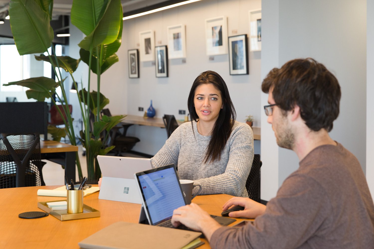 Team working on laptops on a reliable office network