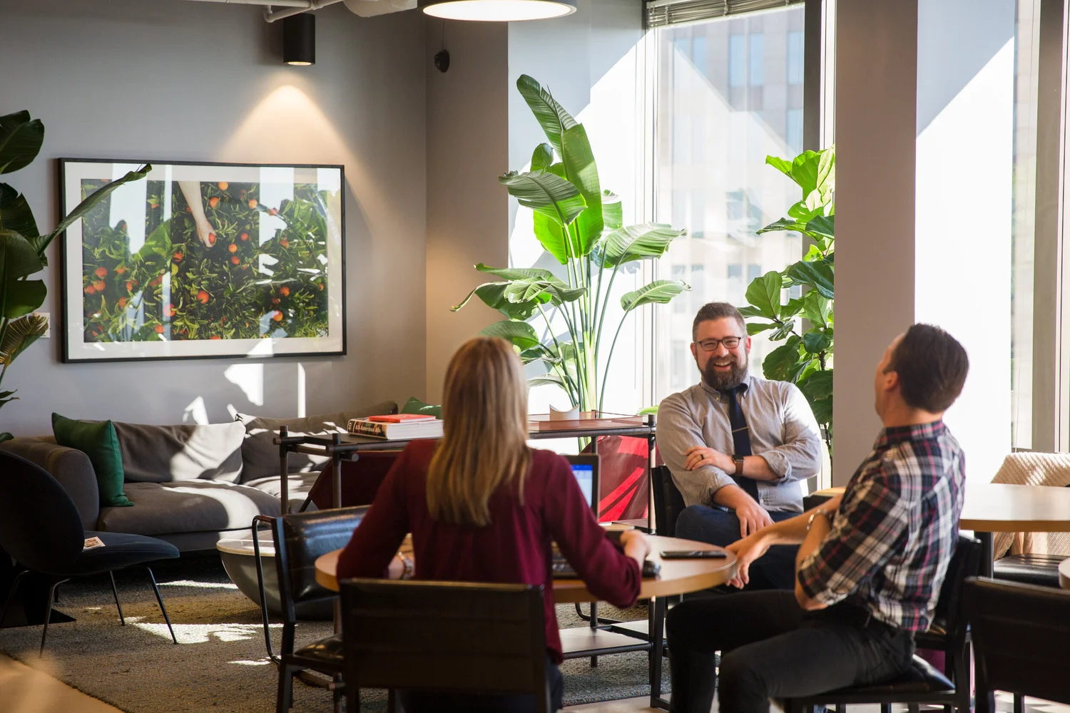 Atlas team reviewing AI reports with a client
