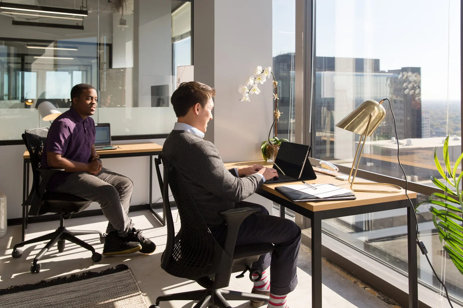 Team member setting up a company Mac