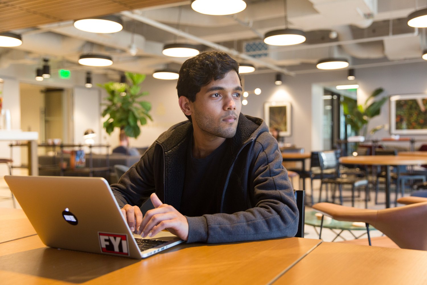 Atlas consultant reviewing a company AI assistant with a client