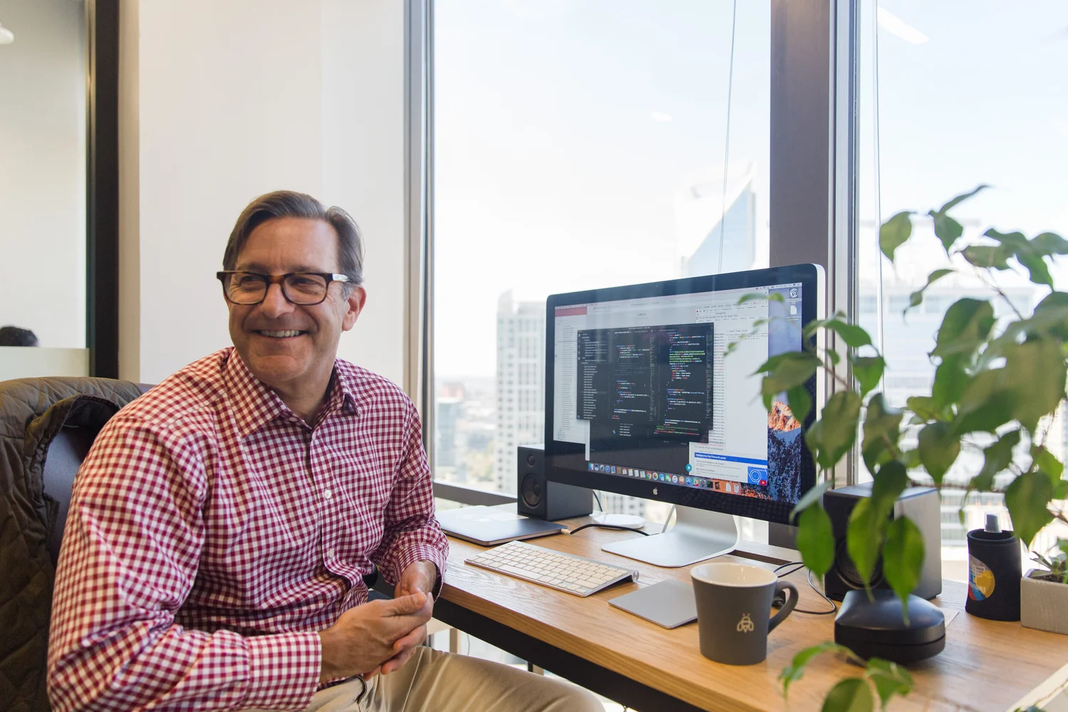 Atlas Solutions consultant at his desk